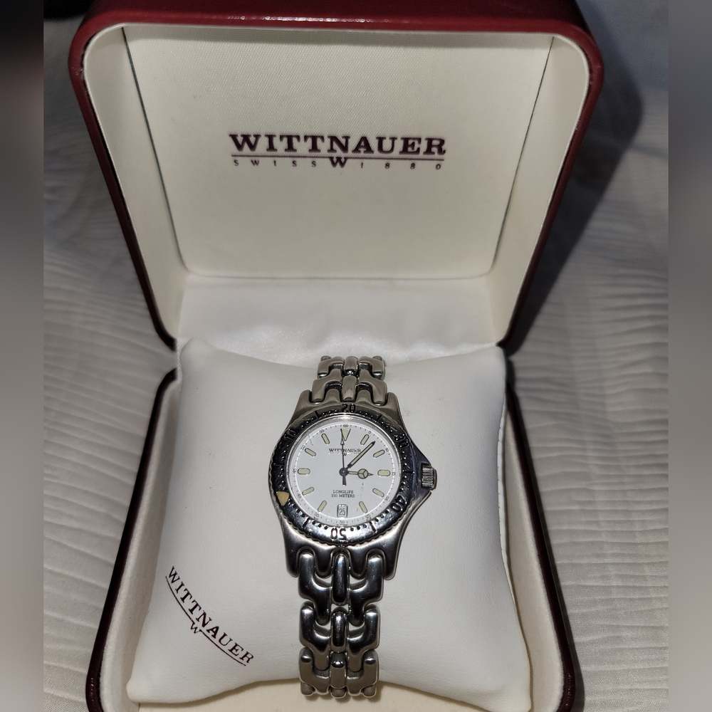 Vtg Wittnauer stainless steel 100m rotating  bezel glow dark indicators in box.